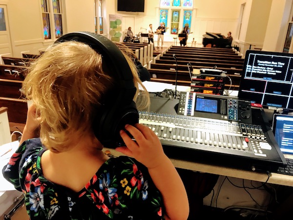 Clara at the sound board